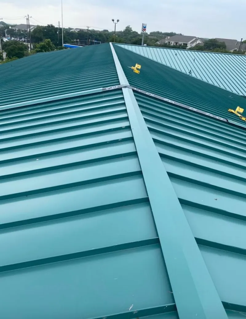 Green commercial metal roof ridge and valley for Metal Roof Repair in Lockwood