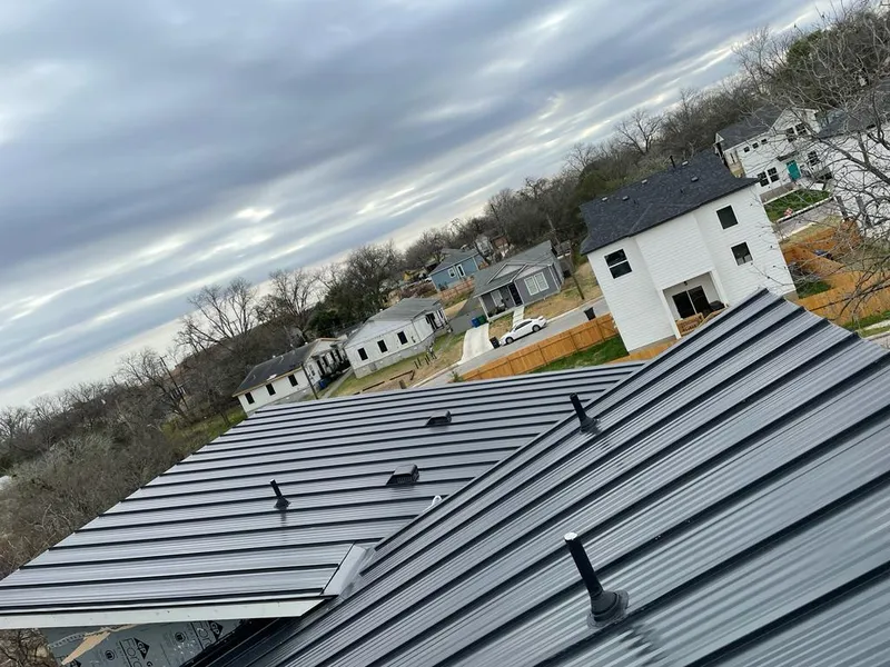Standing seam metal roof panels with vents for Skylight Repair in Lockwood